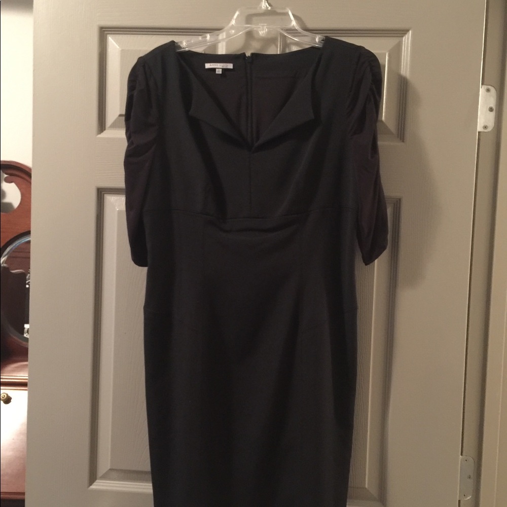 An elegant black three quarter sleeve dress.